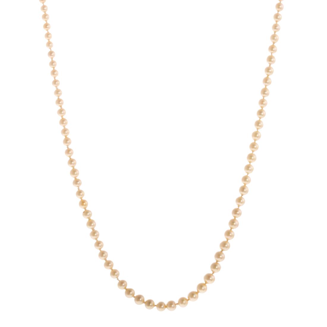 A Strand of Cultured Pearls & Diamond Clasp in 18K (1 of 5)