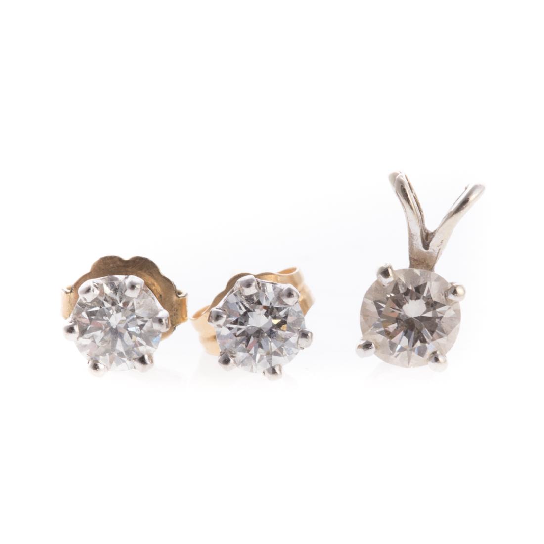 A Pair of Diamond Studs and Pendant (1 of 3)