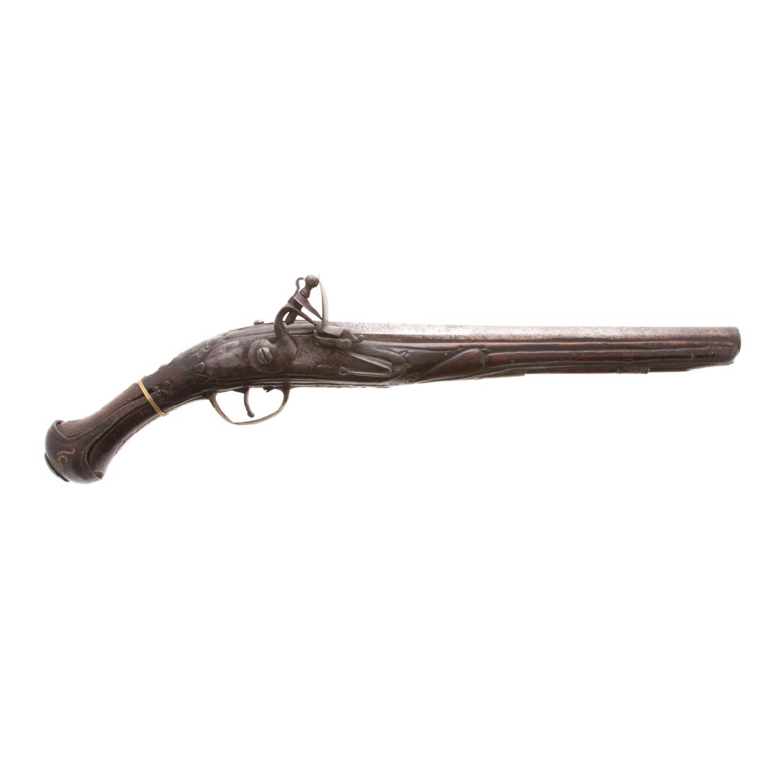 Middle Eastern Flintlock Pistol: 18th century. Nicely decorated