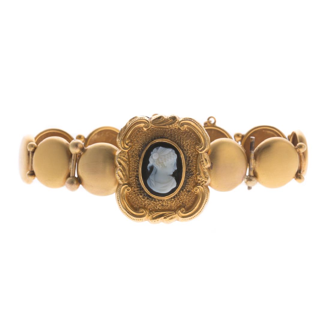 A Lady's Onyx Cameo Bracelet in Gold (1 of 4)