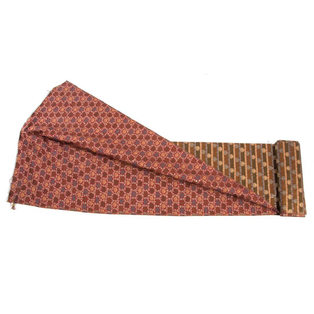Bolt of designer brocade fabric: contemporary; "Lotus Antique Red," approx. 7 yards