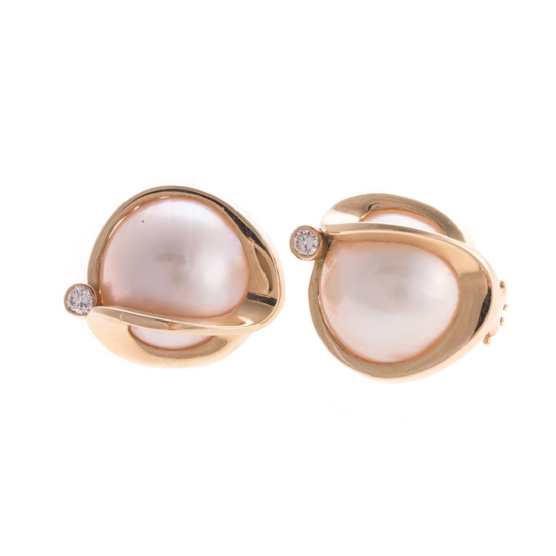 A Pair of Fine Mabe Pearl and Diamond Earrings (1 of 3)