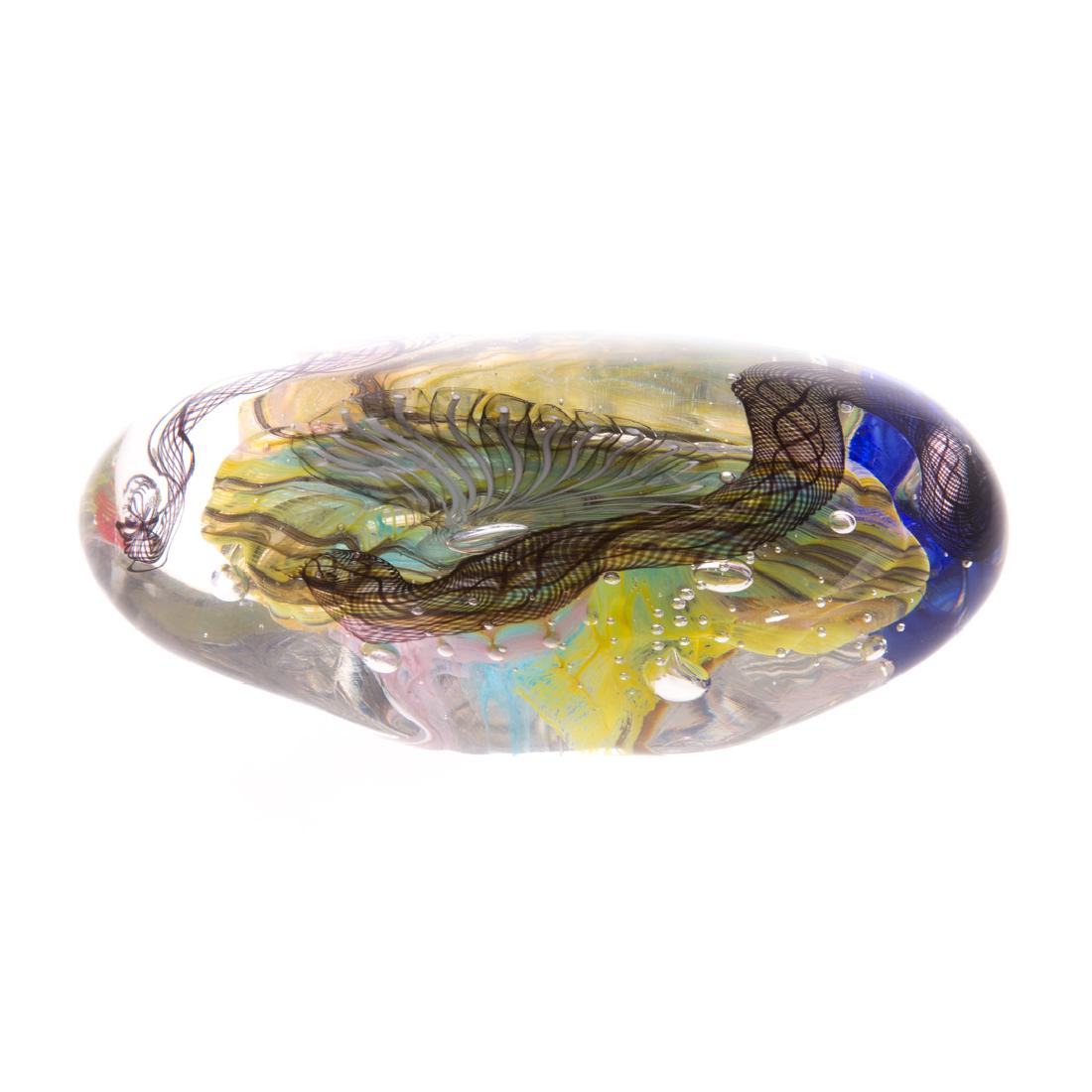 Eric Rubinstein. Art glass paperweight: (American, b. 1956). Clear abstract art glass paperweight, inscribed "Rubinstein 1999," 2 1/2 in. H., 6 in. L.; Eric Rubinstein is a highly awarded contemporary glass artisan