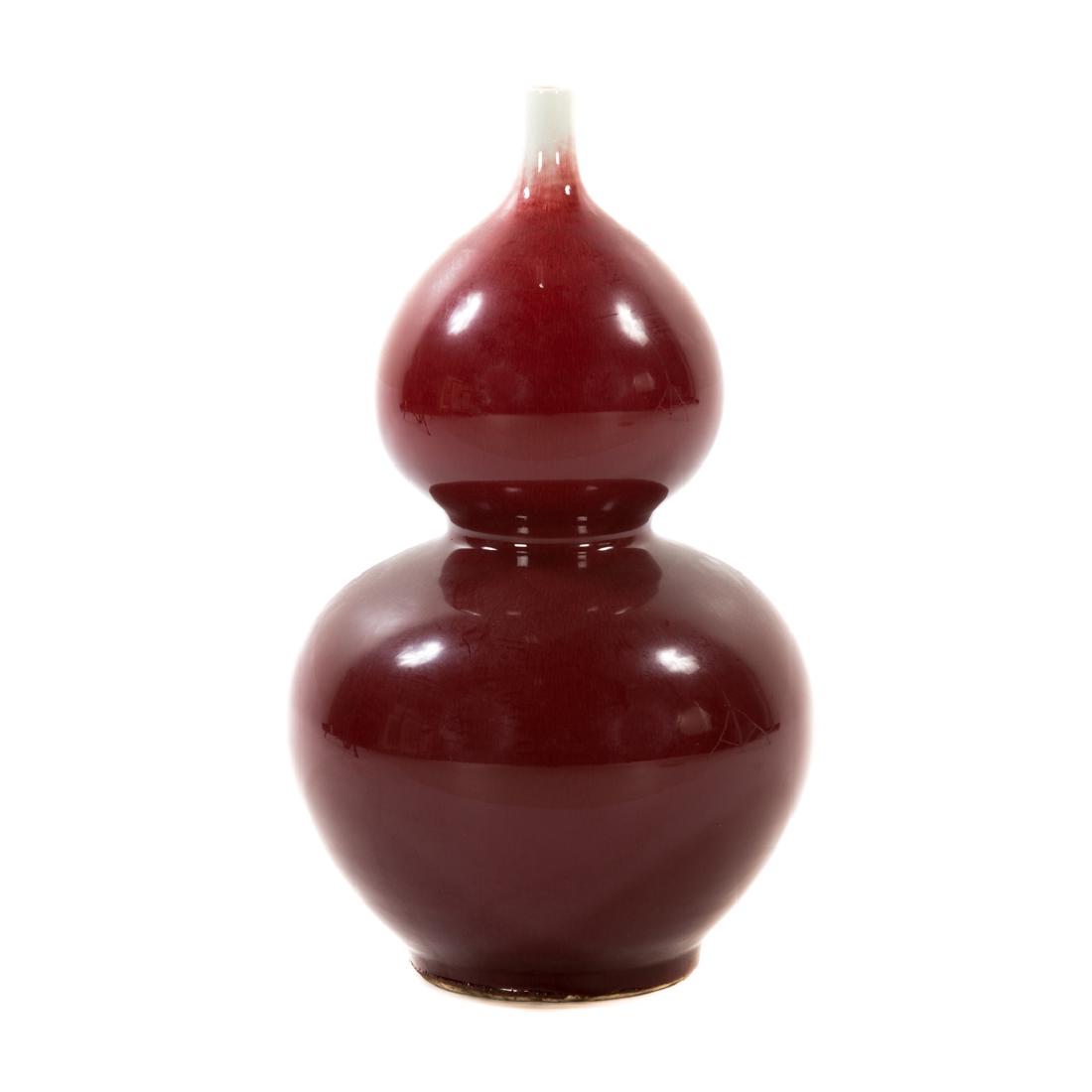 Chinese sang-de-boeuf double-gourd vase: 20 in. H.
