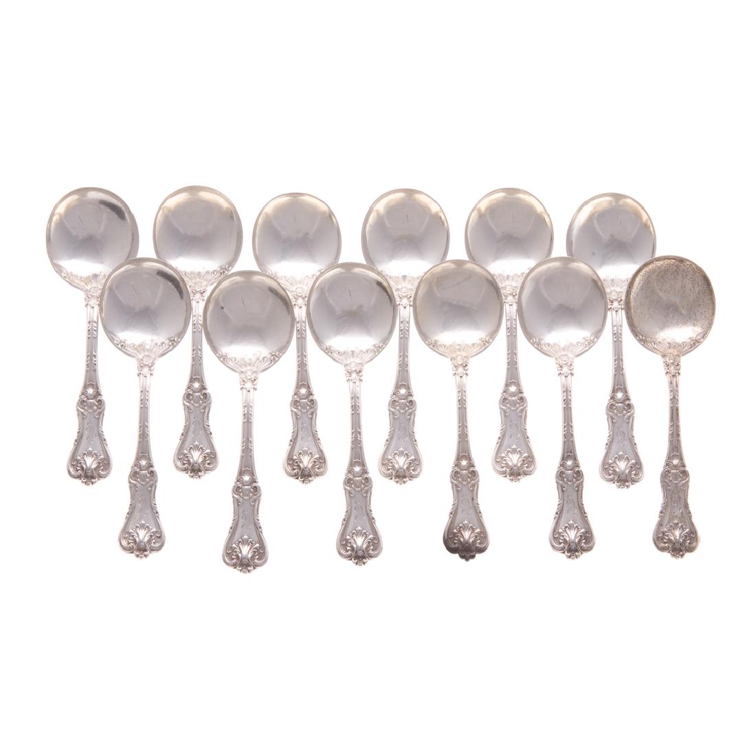 Set of 12 sterling soup spoons by Frank Smith: in the "Federal Cotillion" pattern, 1901 hallmark, 5 1/4 in. L., 12.15 ozt.
