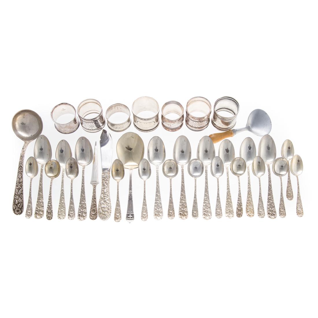 Assorted silver flatware and napkin rings (1 of 5)