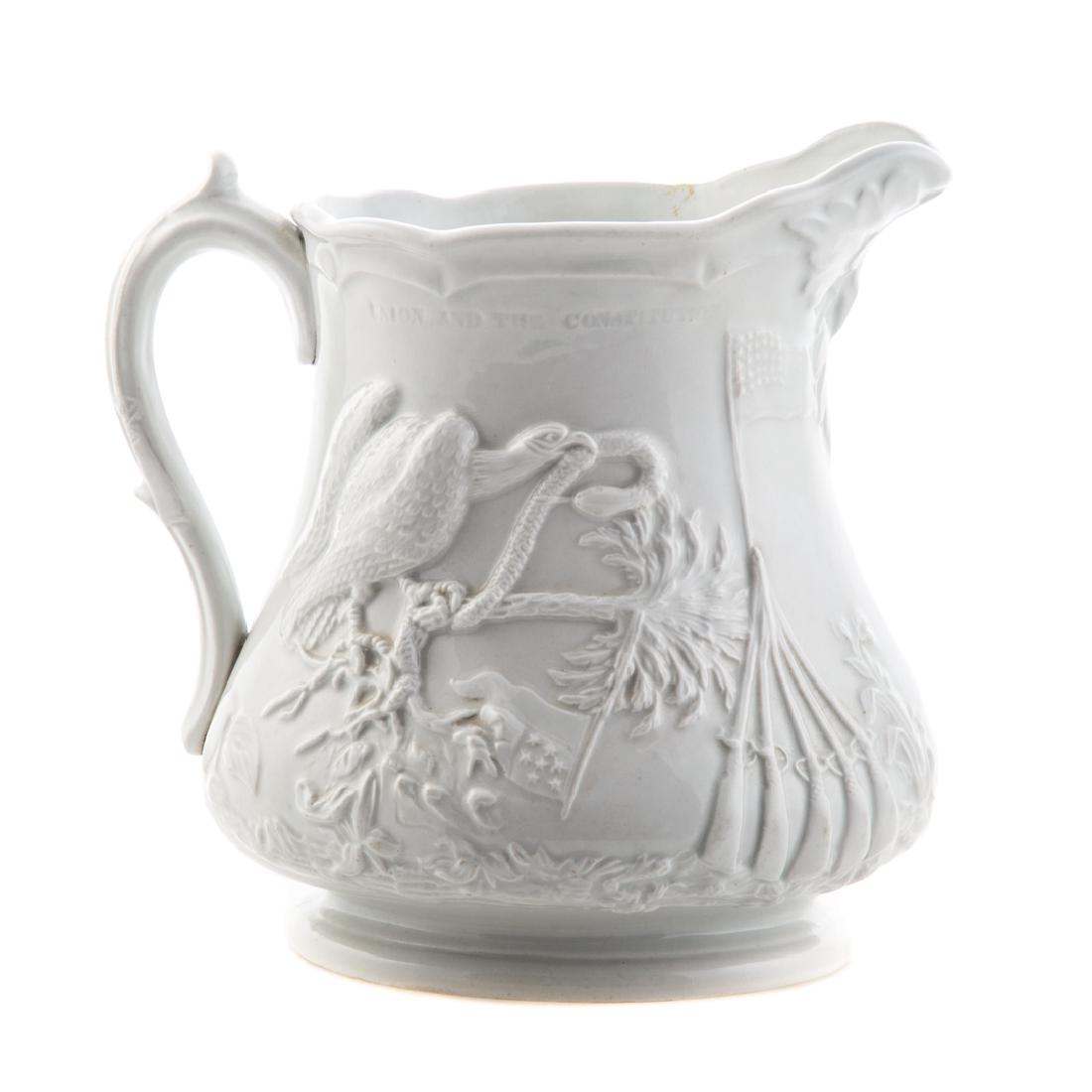White graniteware Colonel Ellsworth pitcher: by Millington, Astbury & Poulson, Trenton, NJ, circa 1861, impressed mark; commemorating the shooting of Colonel Elmer Ellsworth in Alexandria, VA during the Civil War, 9 in. H.