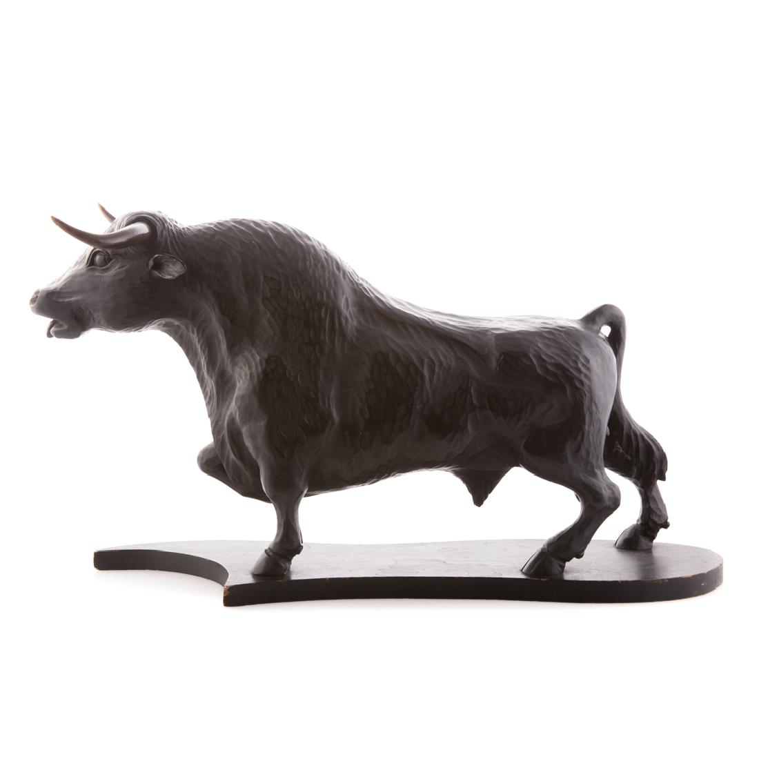 Carved and ebonized wood bull: standing bull with real carved horns, 15 in. H., 24 in. L.