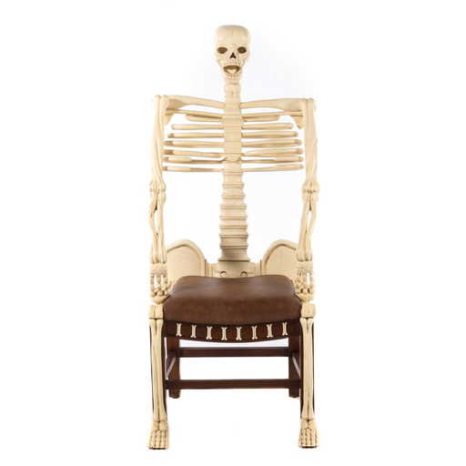 carved and painted wood skeleton chair