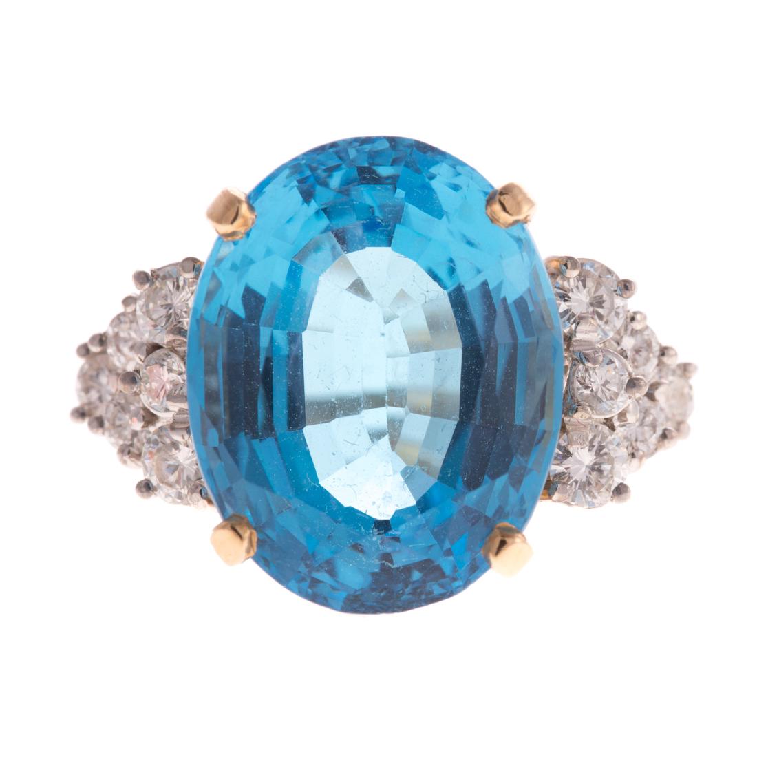 A Lady's Blue Topaz & Diamond Ring in 14K Gold (1 of 5)
