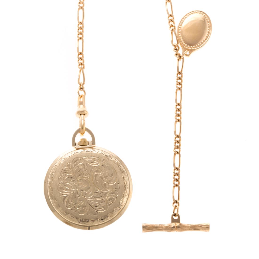 An Engraved Hunter Case Pocket Watch in 14K (1 of 3)