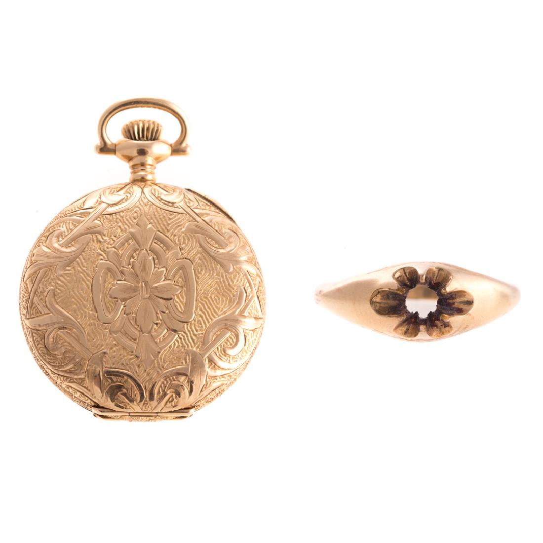 A 14K Lady's Pocket Watch and Gold Ring Mounting: 1) 14K yellow gold Francis B Wallen hunter case pocket watch with engraved floral design on case, white dial with Arabic numbers and second hand sub dial, 1.25 in. in and 2) 14K yellow gold ring mount
