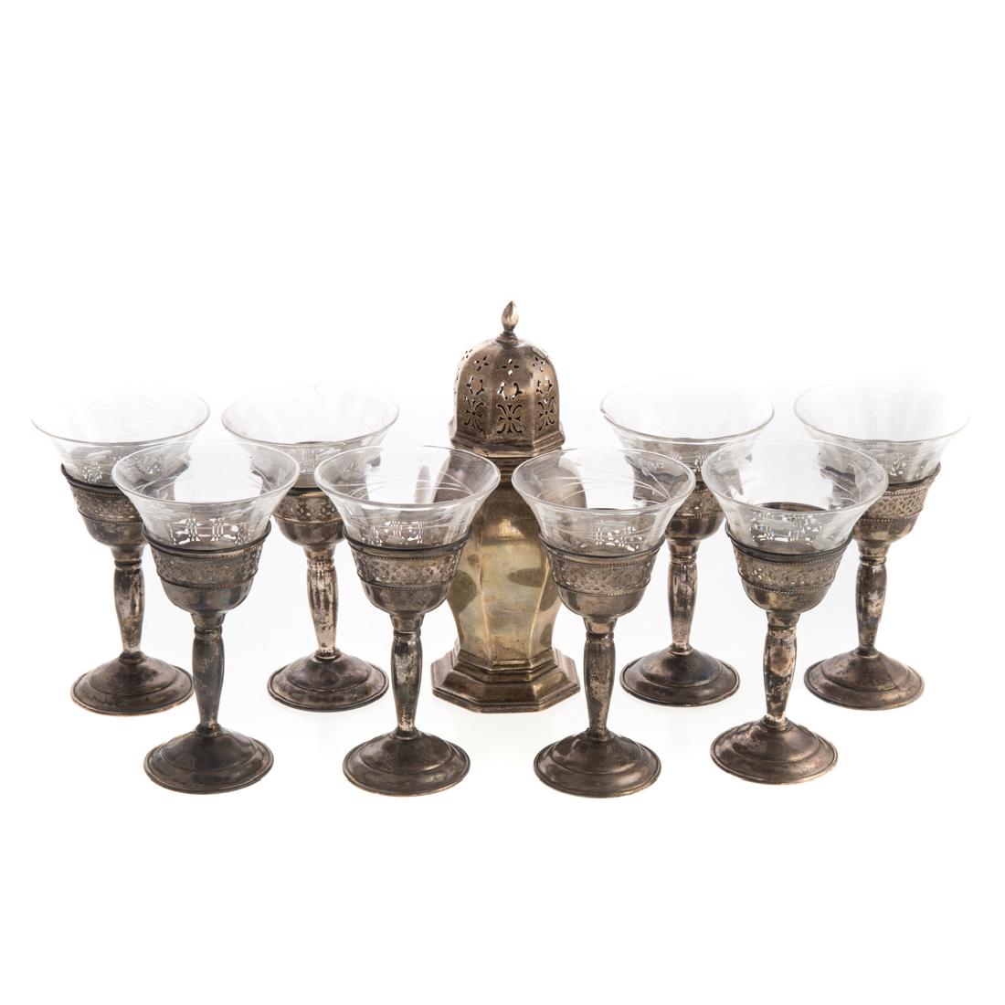 Set of 8 Redlich wine crystals with sterling bases: New York, first half-20th century; together with an English sterling sugar caster, Deakin & Francis Ltd., Birmingham, 1920; 11.45 ozt. weighable silver