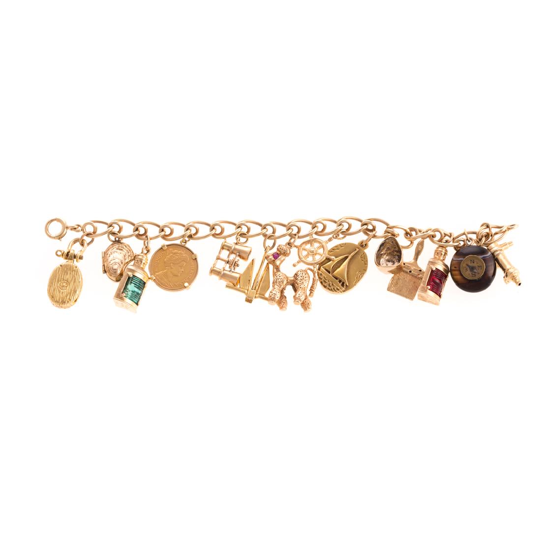 A Lady's 14K Nautical Themed Charm Bracelet (1 of 6)