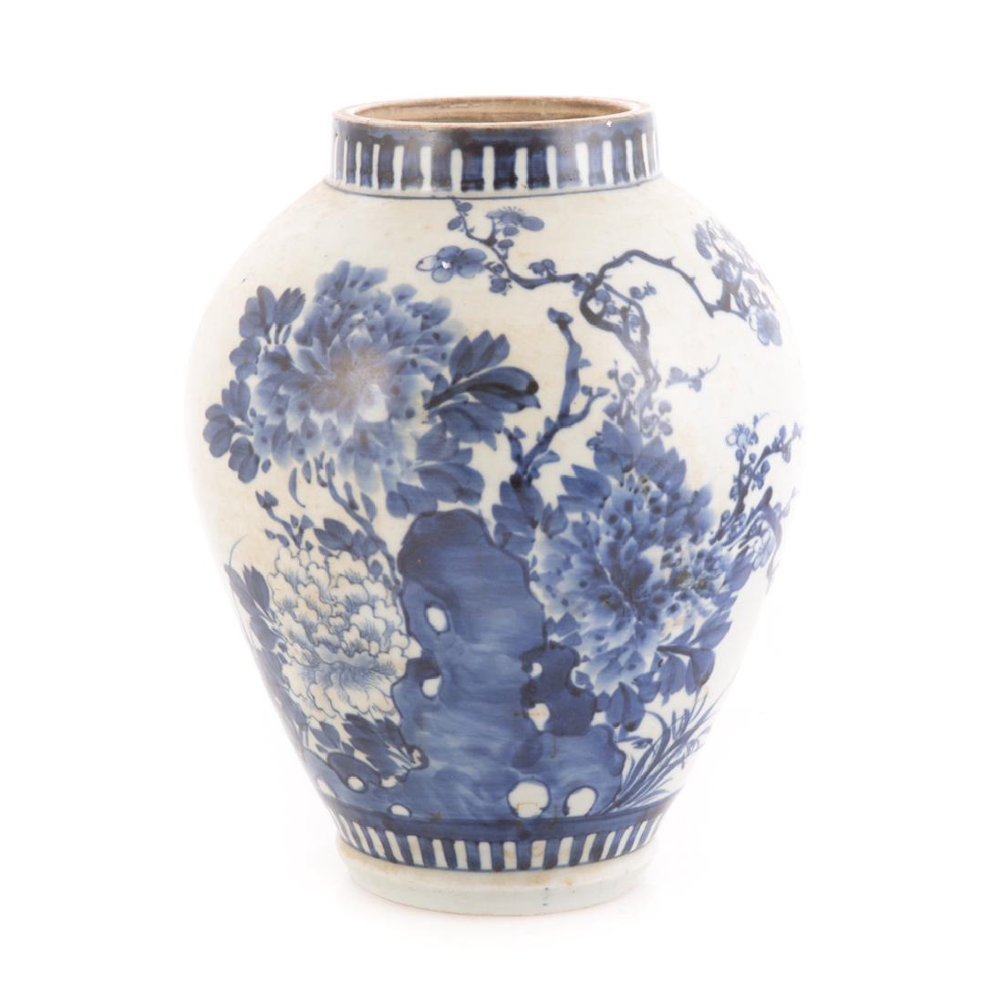 Japanese Arita porcelain vase: 18th century or earlier; floral decoration, with character marks, 9 1/2 in. H.