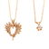 A Pair of 14K Diamond Pendants