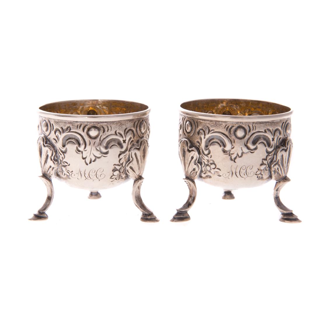 Rare pair Victorian Kirk coin silver egg cups: circa 1865, with gilt interiors and hoofed feet, 2.80 ozt