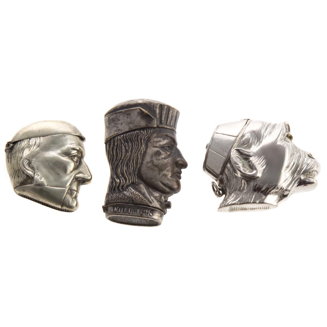 Three figural silver-plated head match safes (1 of 5)