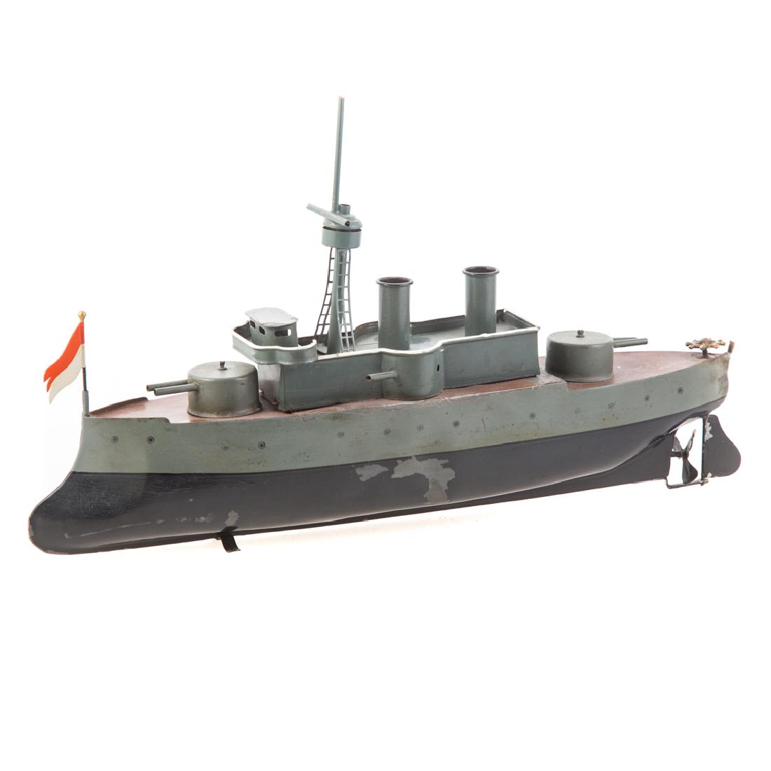 Bing tinplate armored cruiser: circa 1912; clockwork motor, two revolving gun turrets, 16 in. L