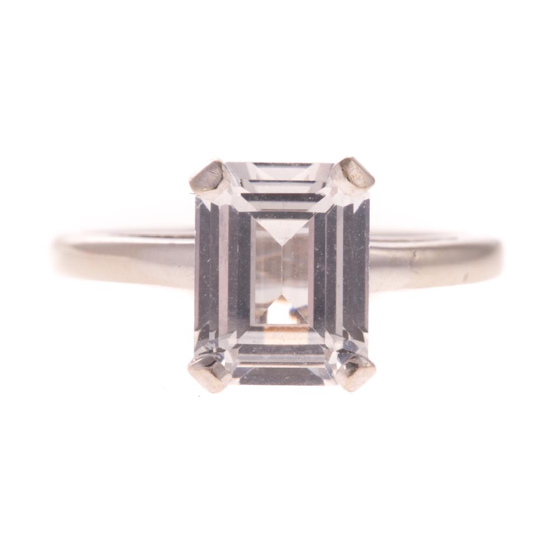 A Lady's 14K Emerald Cut White Sapphire Ring (1 of 4)