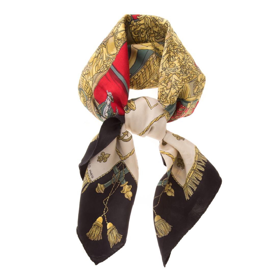 A Hermès “Vue Du Carosse De…” Scarf 90: Black and multicolor Hermès 90 cm silk scarf with “Vue Du Carosse De…” motif and hand rolled edges.