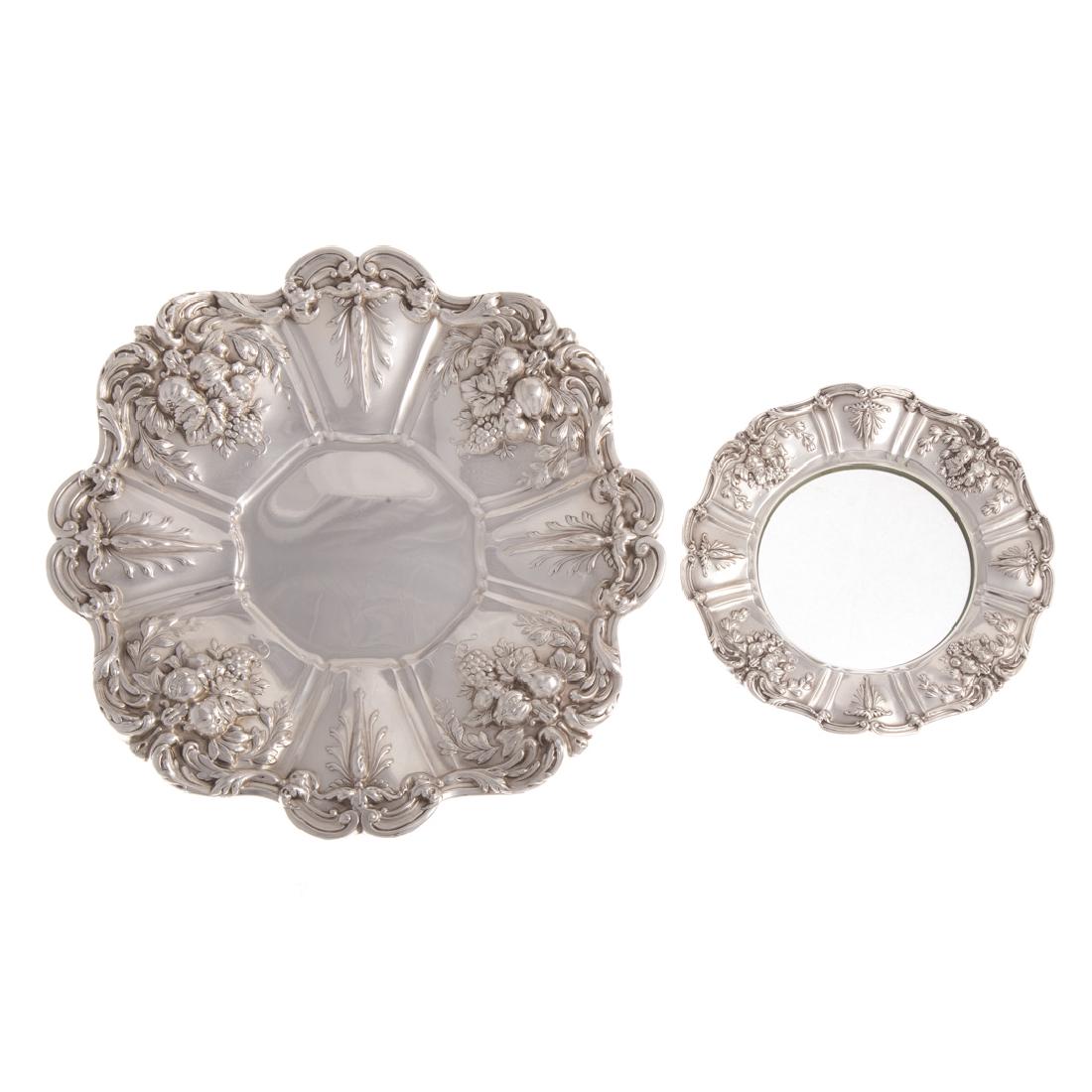 Two Reed & Barton "Francis I" sterling items: 1) 11 in. sandwich plate, model X569, 1955 date mark, and 2) etched glass and sterling wine coaster, model X567, 1953 date mark, 7 in. Diam.; 17.95 ozt. weighable