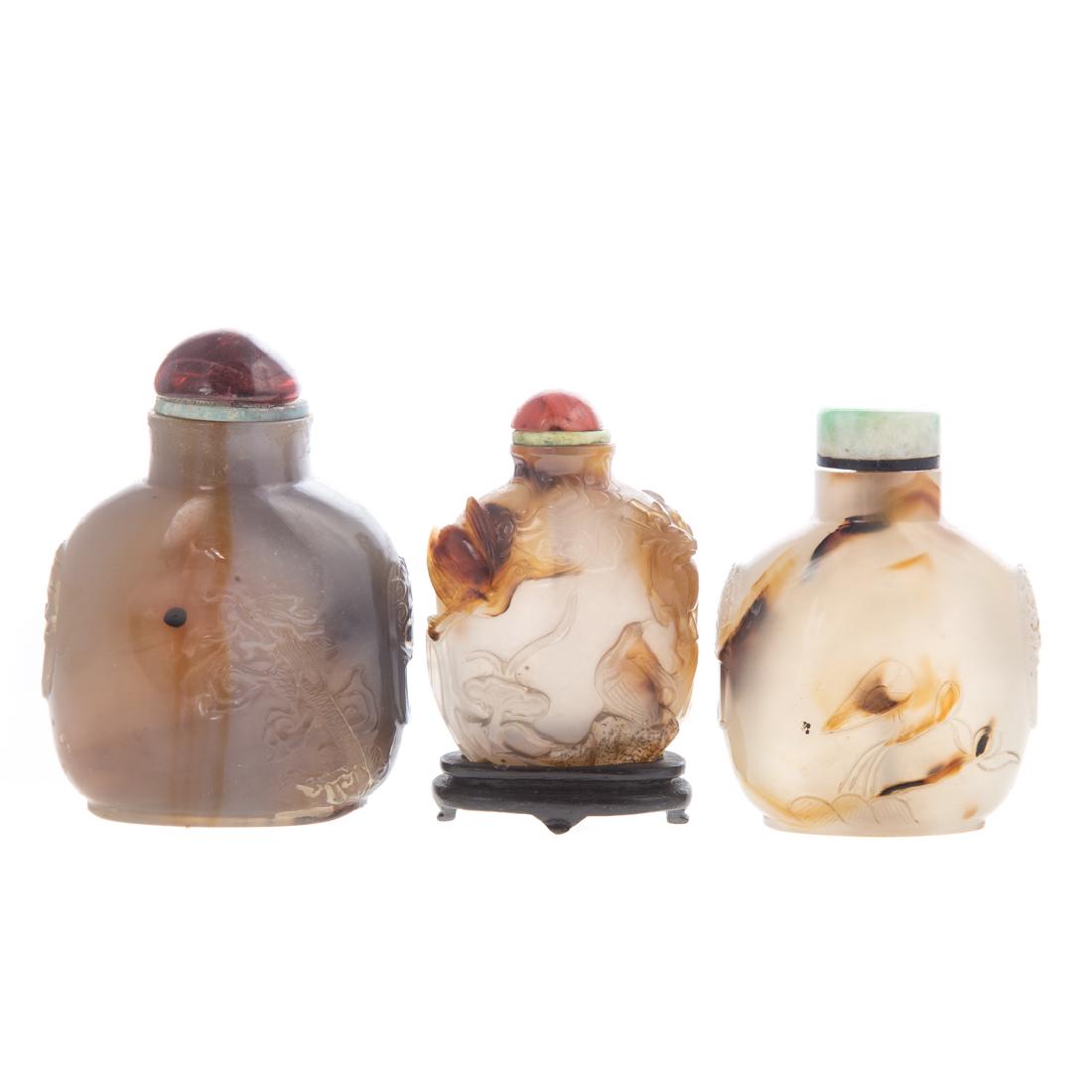 Three Chinese carved chalcedony snuff bottles (1 of 5)