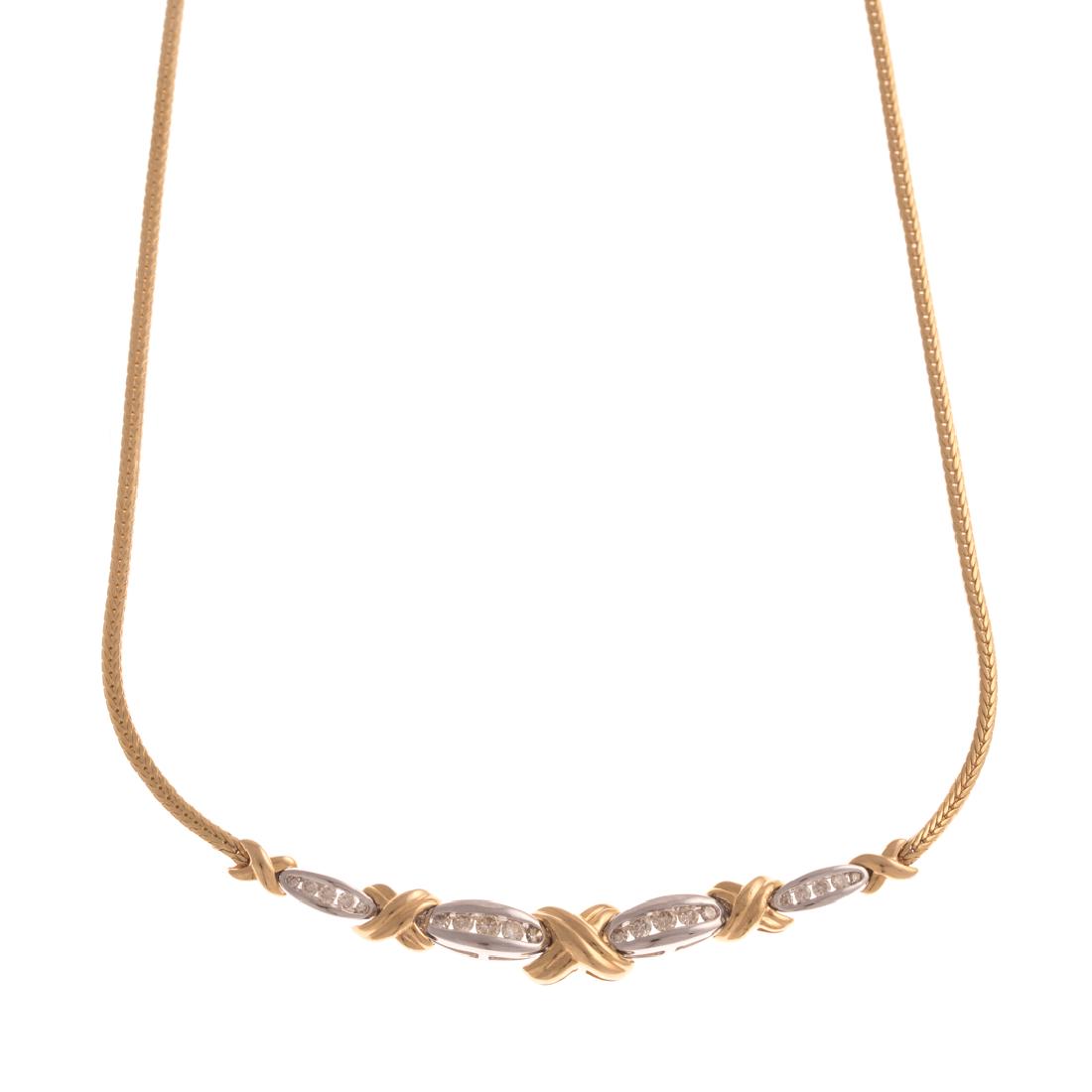 A Lady's 14K Two Tone Diamond "X" Necklace (1 of 4)