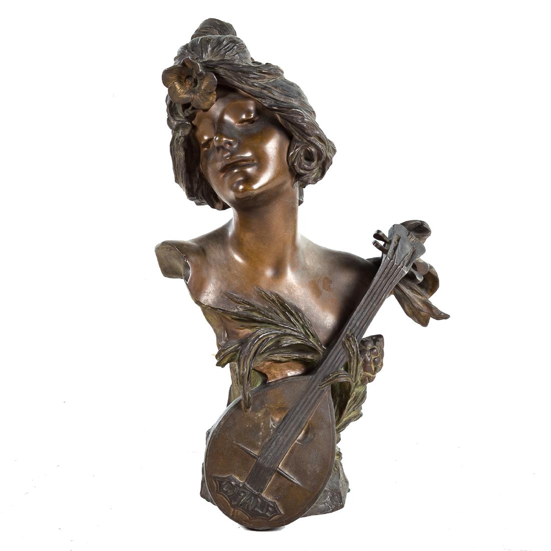 Julien Causse. Cigale bronze bust: (French, 1869-1914). Art Nouveau bronze bust of young beauty with lute, title on lute in relief letters, signed "J. Causse," 22 in. H.