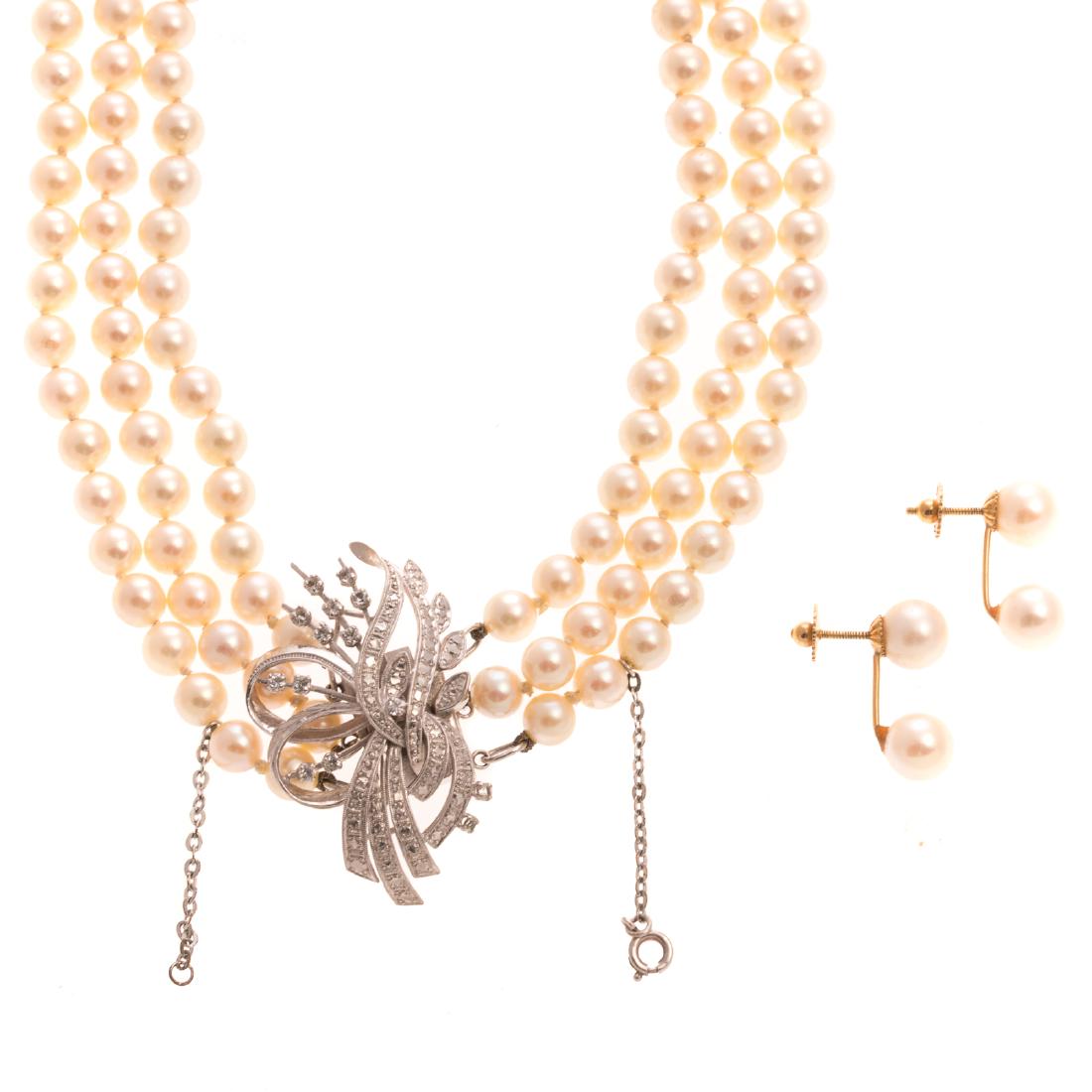 A Triple Strand Pearl Necklace with Diamond Clasp (1 of 4)