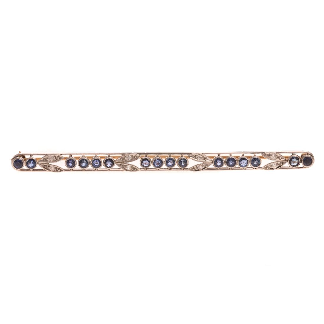 An Art Deco Sapphire & Diamond Bar Pin in Platinum (1 of 3)