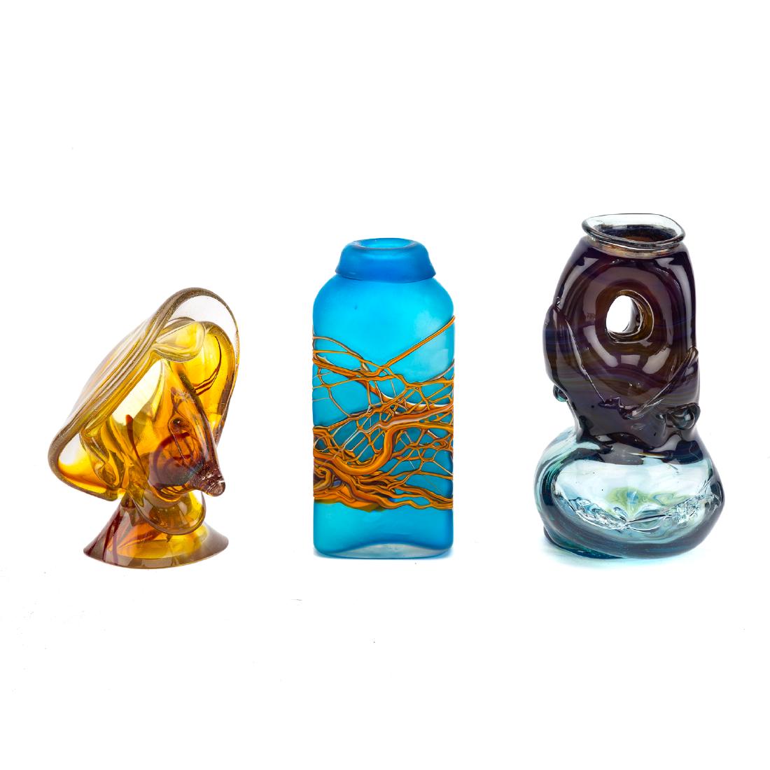 Three pieces of American art glass: including; sculpture signed by Peter Bramhall ,signed "Bramhalll 9/2/71," 9 in. H., string decorated blue vase,9 in. H. and an amber glass sculpture, 8 in. L. Undernumber 6503.16 Condition: Wear