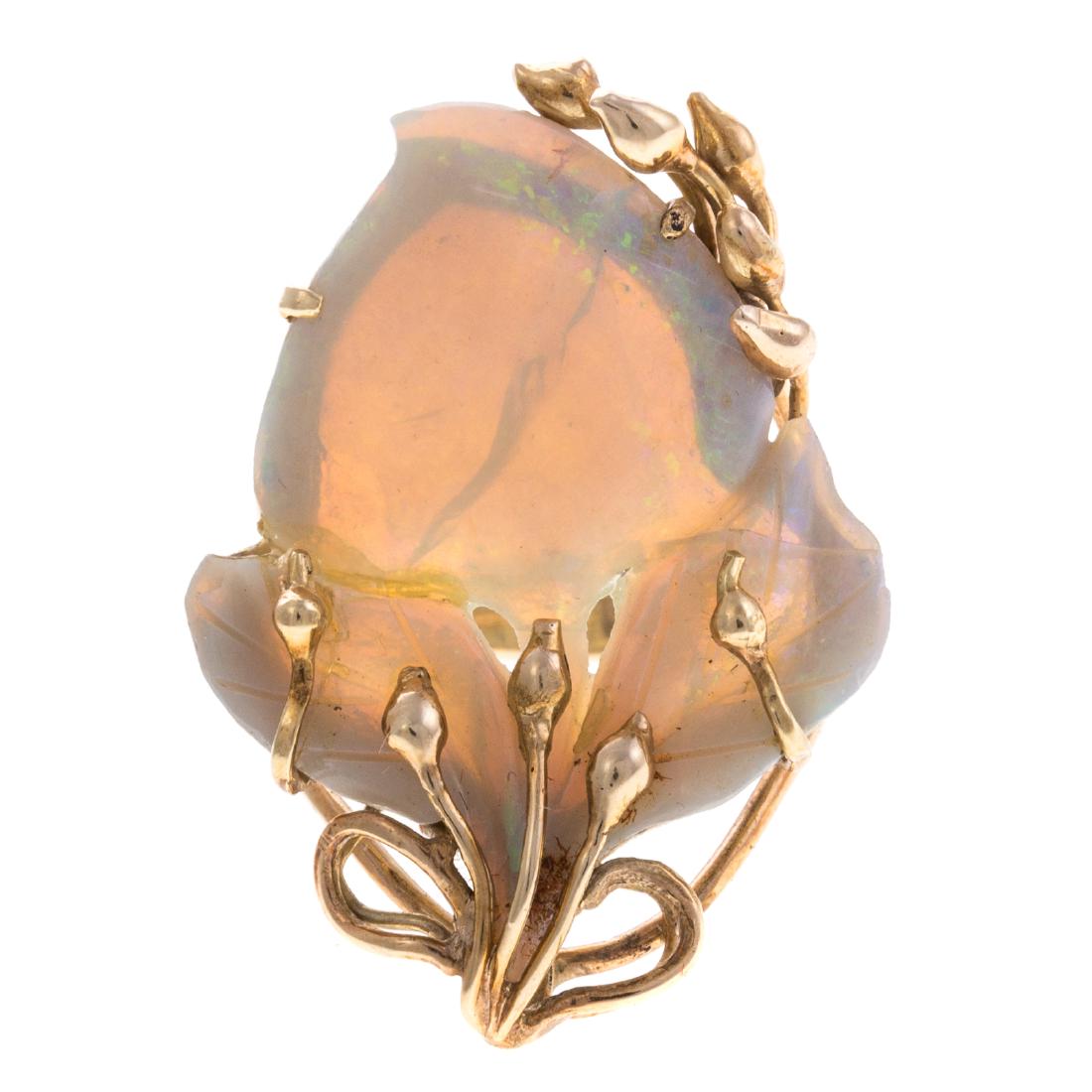 A Lady's 14K Carved Opal Freeform Ring (1 of 4)