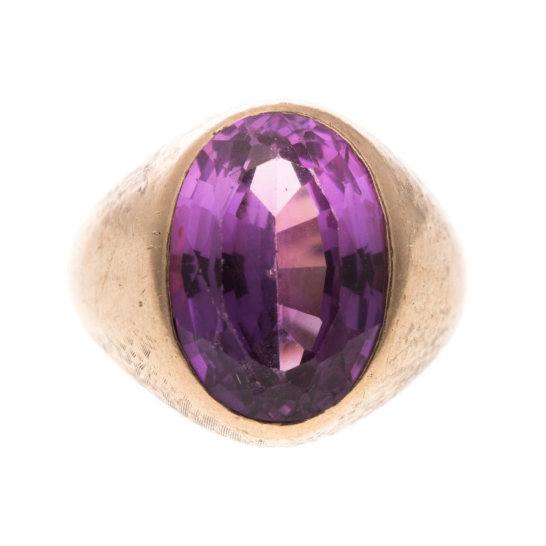 A Gent's 14K Oval Amethyst Ring (1 of 5)