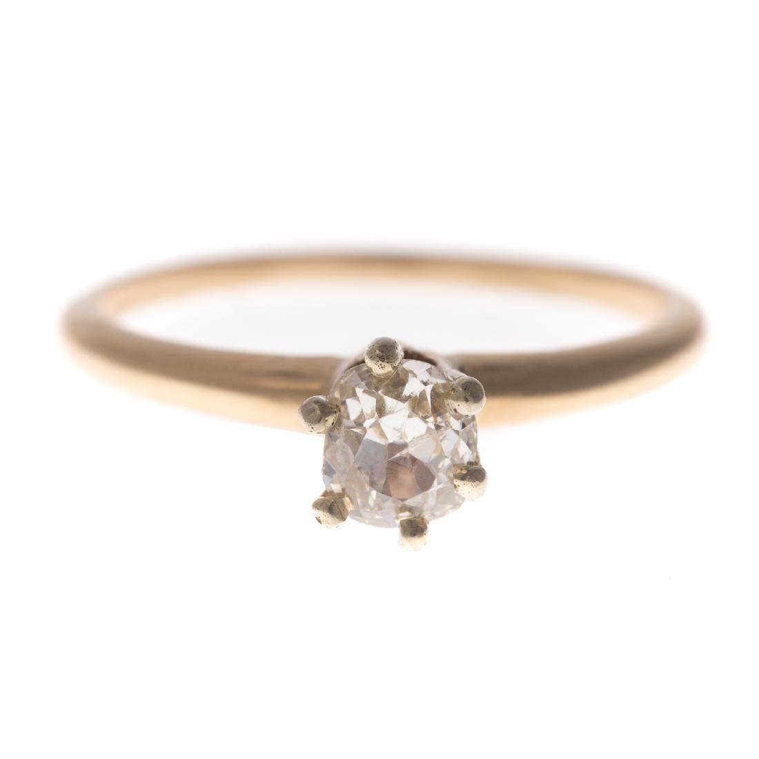 A Lady's 14K Diamond Solitaire Ring (1 of 4)