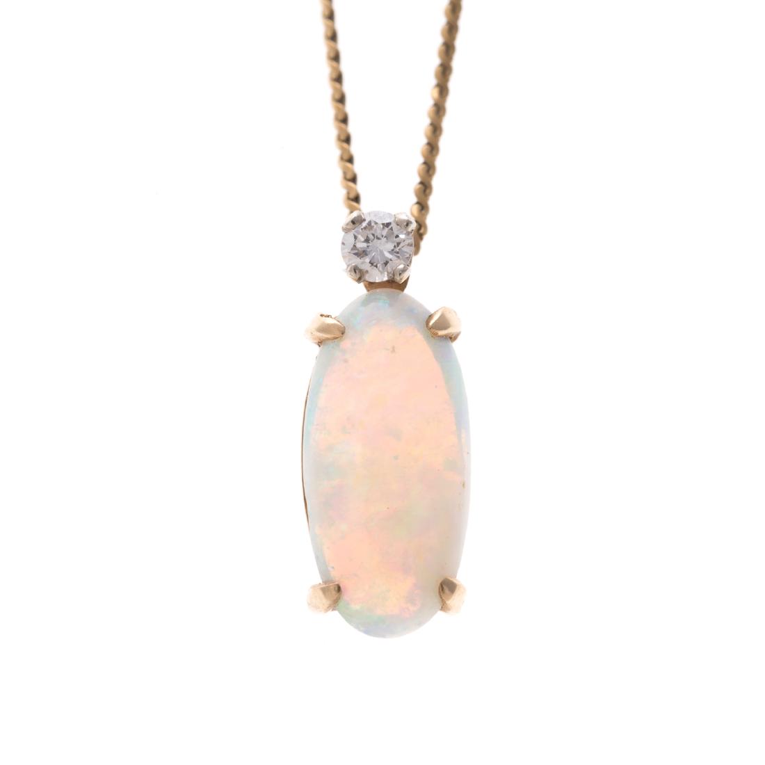A Lady's 18K Opal and Diamond Pendant (1 of 5)