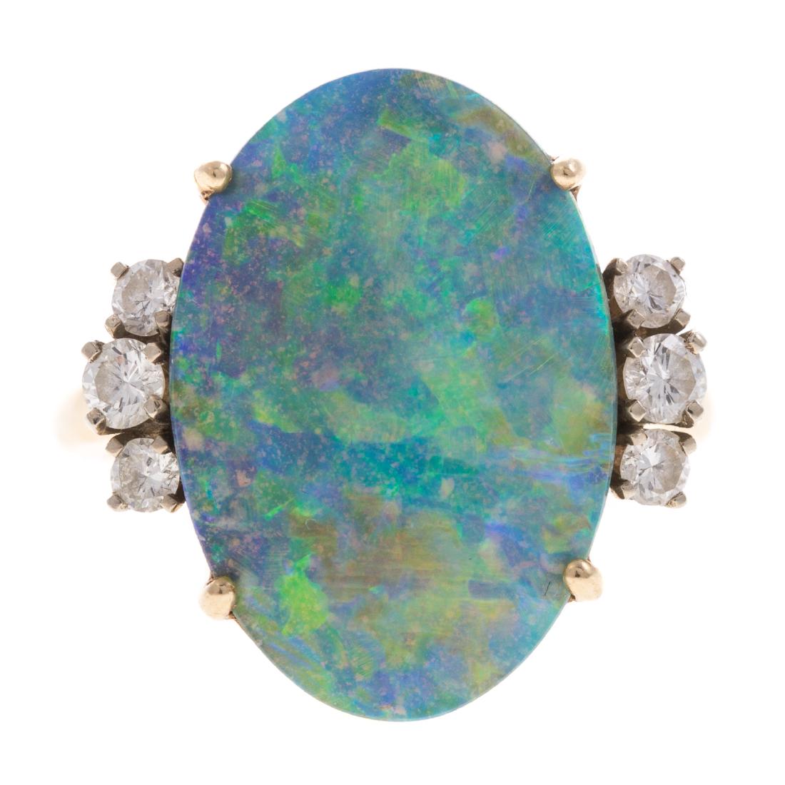 A Lady's 14K Opal and Diamond Ring (1 of 5)