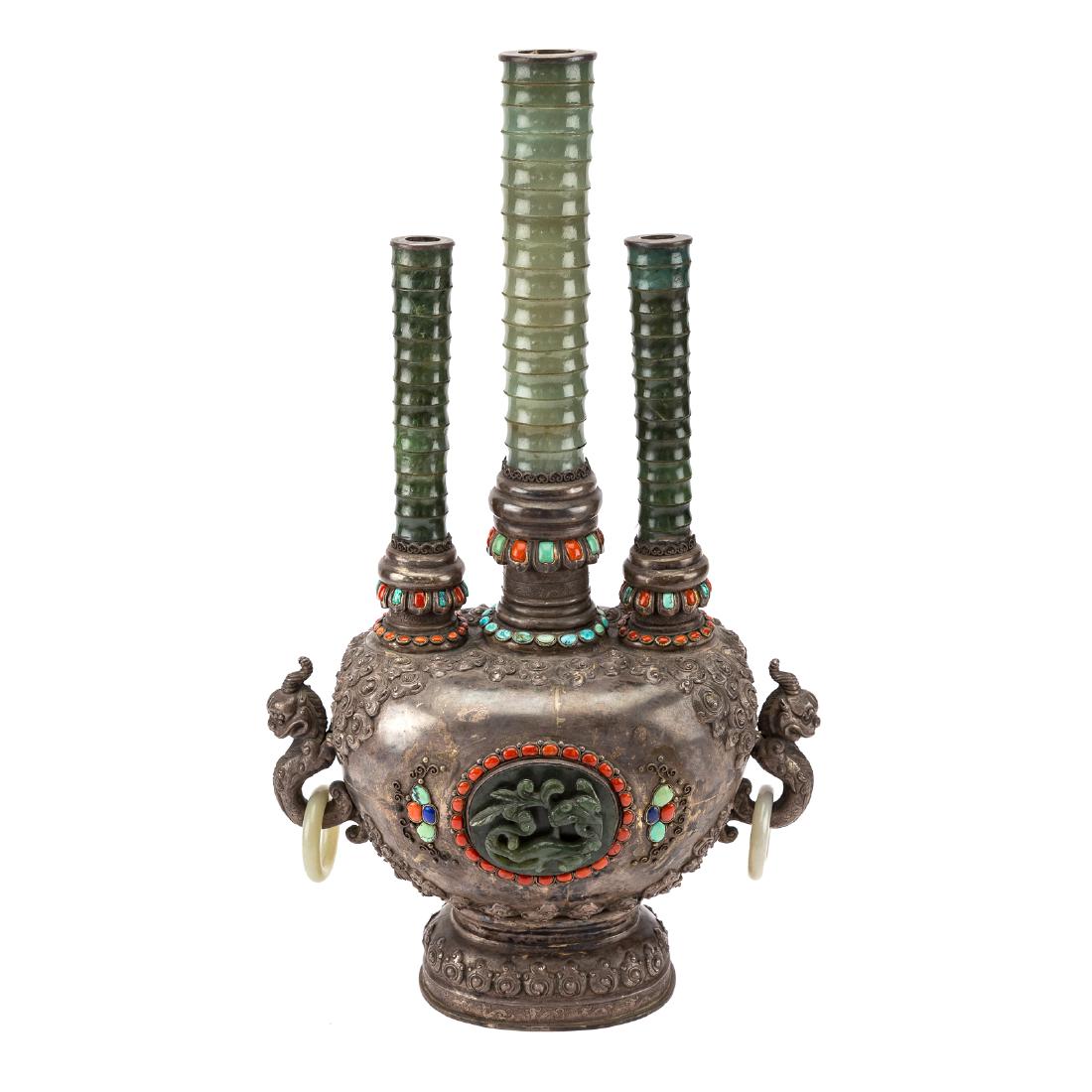 Chinese silver, jade and hardstone wine vessel: 18th century or earlier; silver ovoid body having dragon handles and mutton fat jade rings with three segmented jade necks, each side with carved inlaid spinach jade medallion and inset coral, turquoi