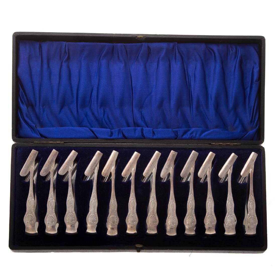 Rare set of 12 sterling individual asparagus tongs (1 of 4)