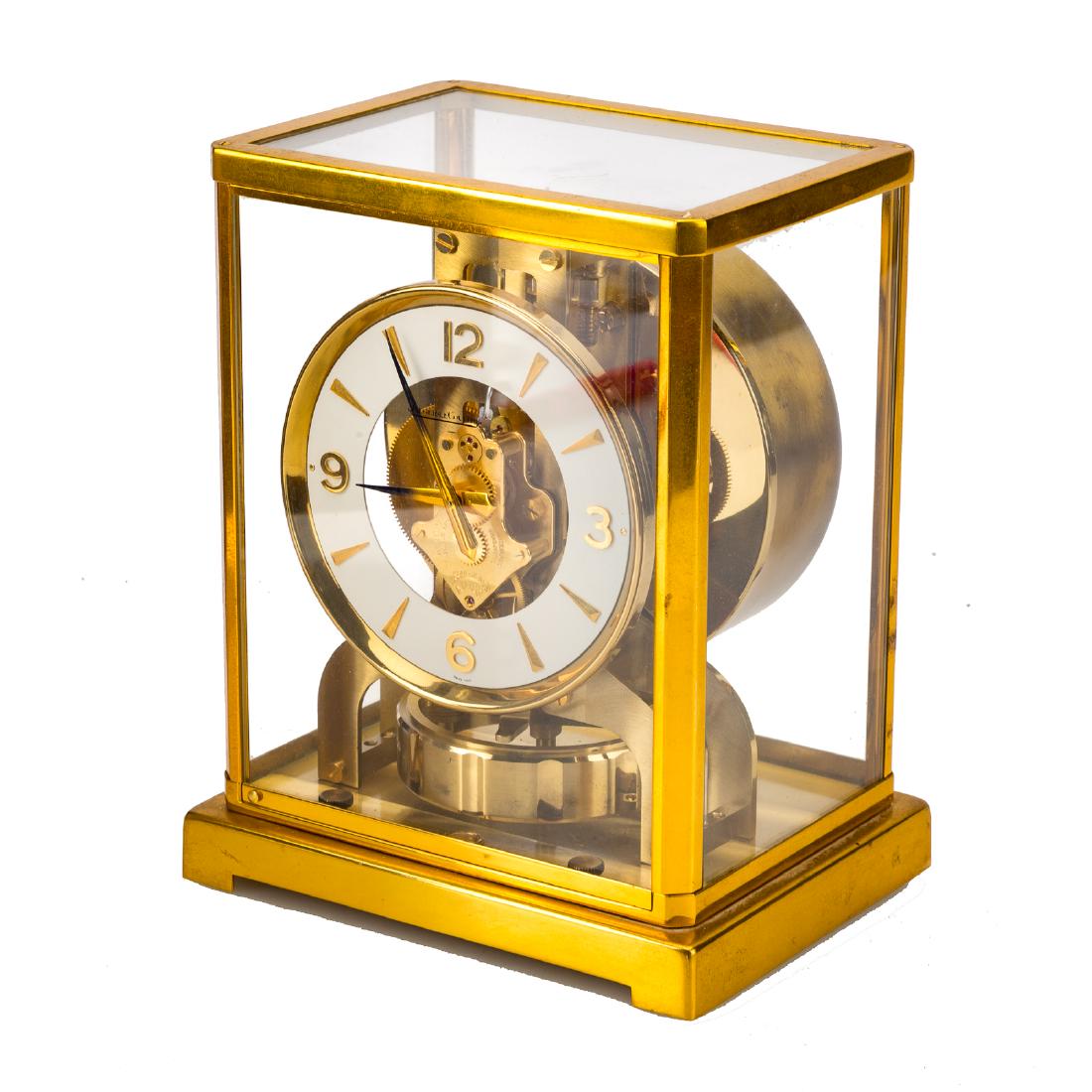 Jaeger-LeCoultre Atmos clock with case: serial # 116938, 8 1/2 in. H., 7 in. W. with storage case