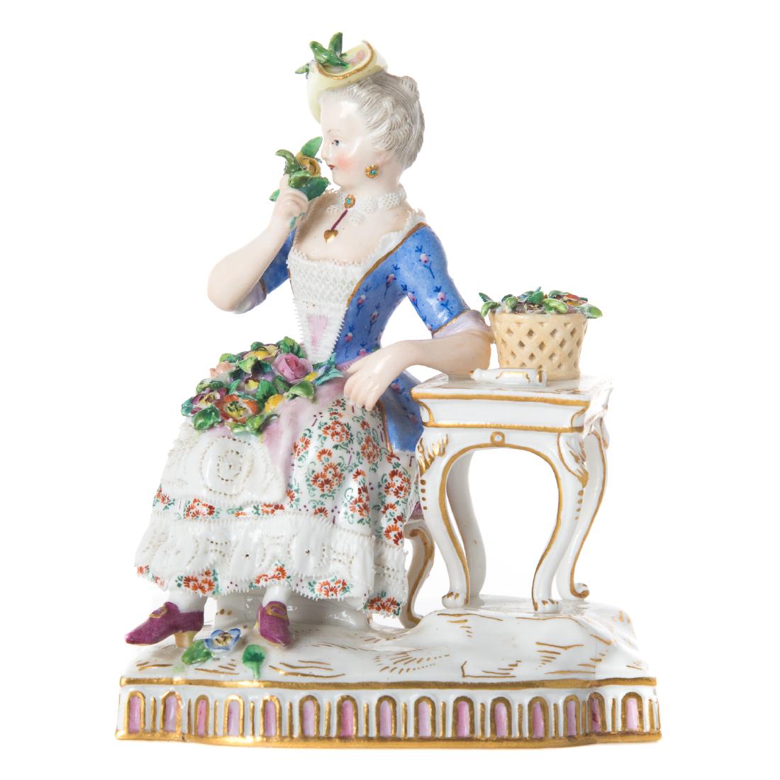 Meissen porcelain seated woman figure (1 of 4)