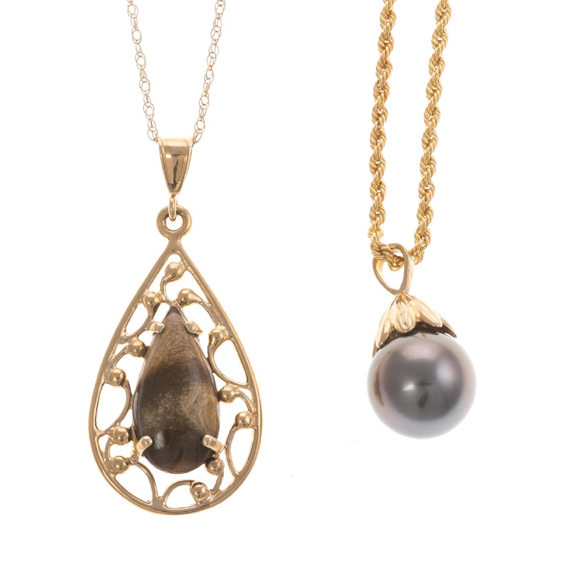 Two Ladies Necklaces in 14K Gold: 14K yellow gold rope chain suspending a Tahitian pearl pendant, 16.5 in. L, and 14K yellow gold interlocking oval link chain with a 14K yellow gold pear shaped pendant, with agate center, 19.25 in. L,