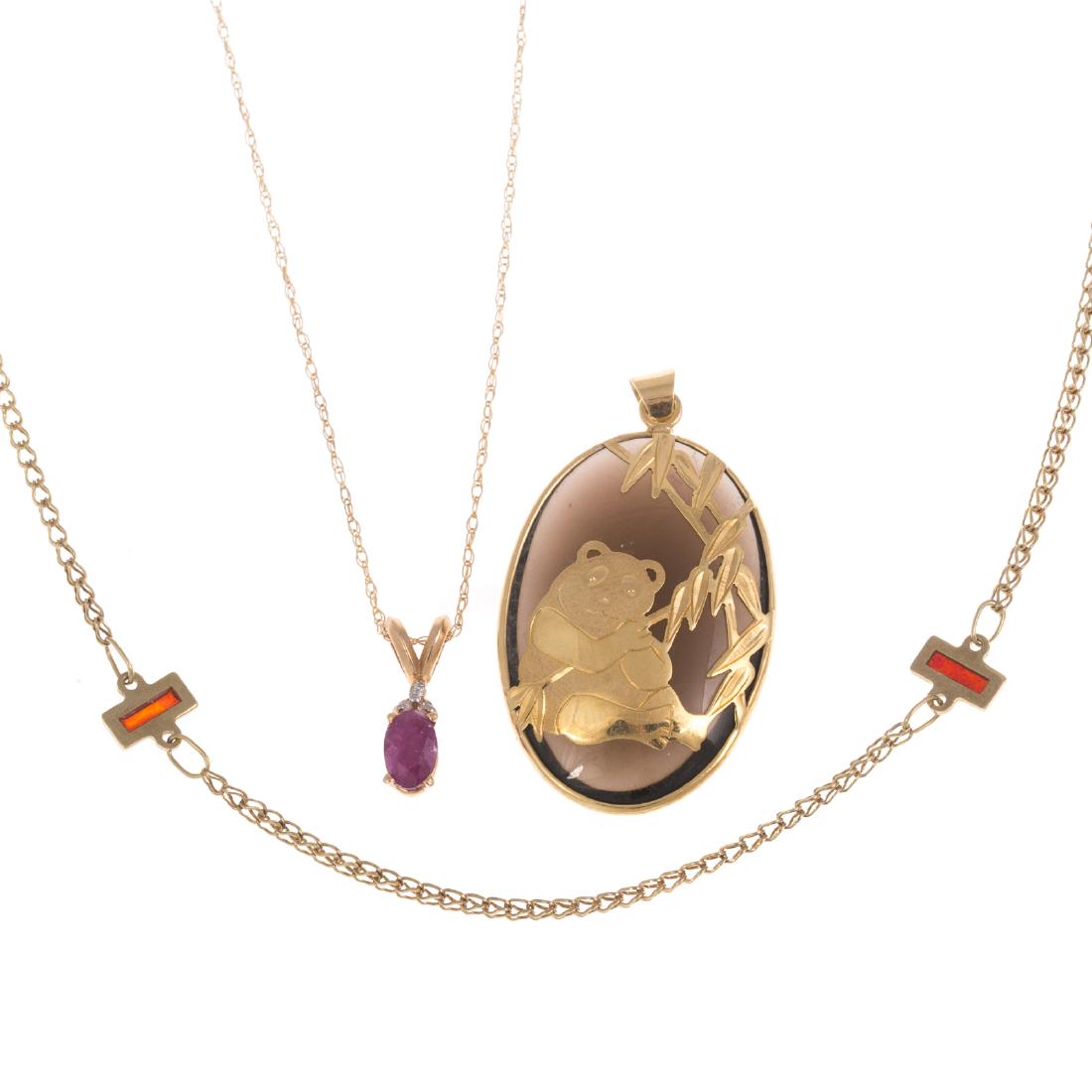 A Trio of Necklaces on Gold (1 of 7)