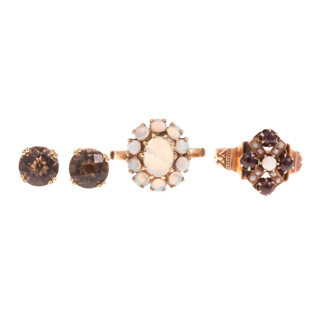 A Pair of Rings & Smokey Quartz Studs in Gold (1 of 4)