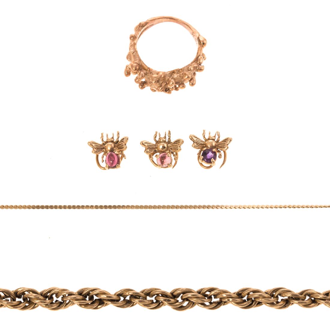 A Collection of Ladies Gold Jewelry: 1)14K yellow gold rope chain bracelet with barrel clasp and figure 8 safety, 7.75 in. L, 2)10K yellow gold freeform gold ball ring, sz 6, 3)three 10K yellow gold small butterfly pins with varying gems