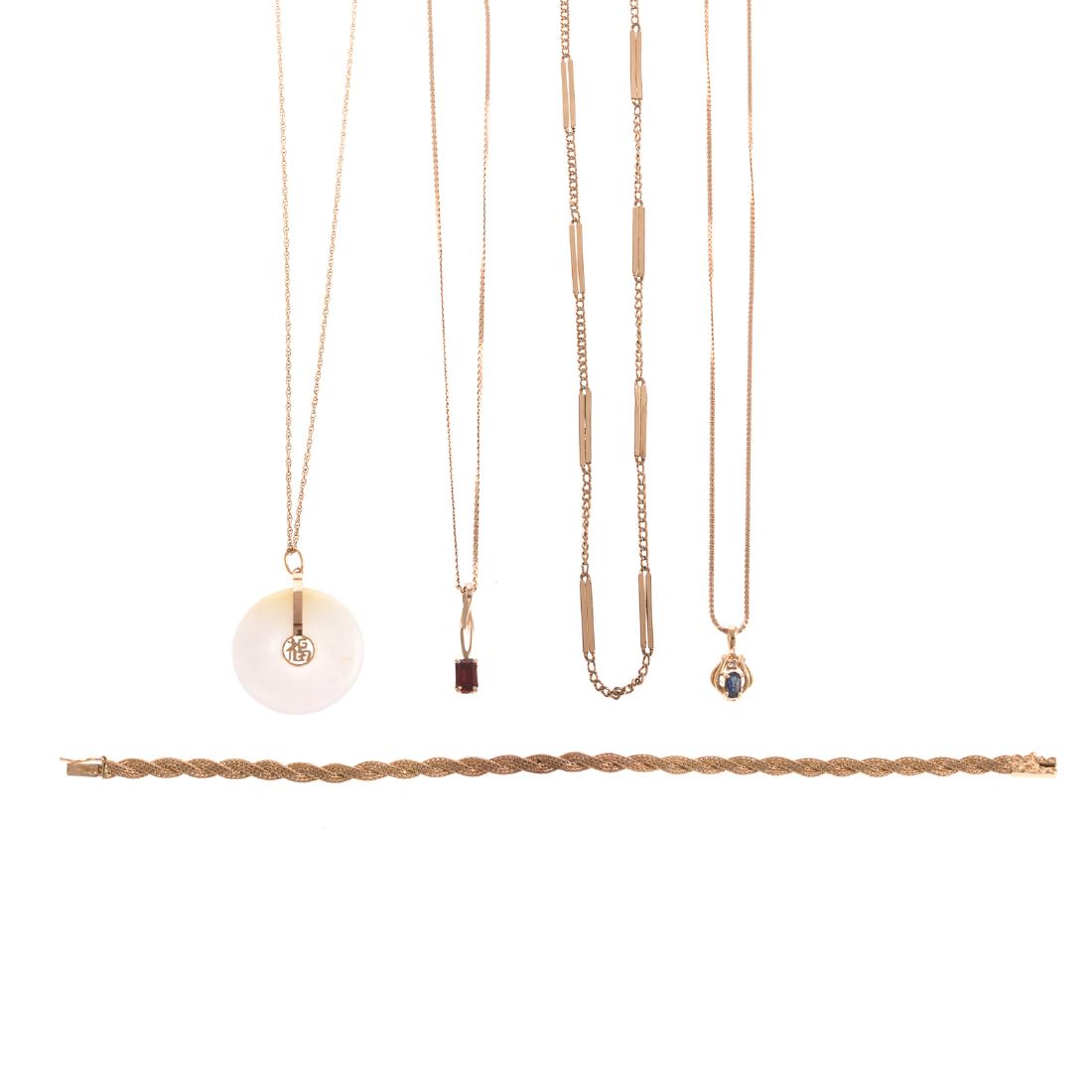 A Selection of Ladies Jewelry Featuring Necklaces: 1) 14K yellow gold serpentine chain with a 14K yellow gold blue topaz and diamond pendant, 16.5 in. L, 2) 14K yellow gold flat braided bracelet, box clasp, safety latch, 6.8 in. L, 3) 14K yellow gold 