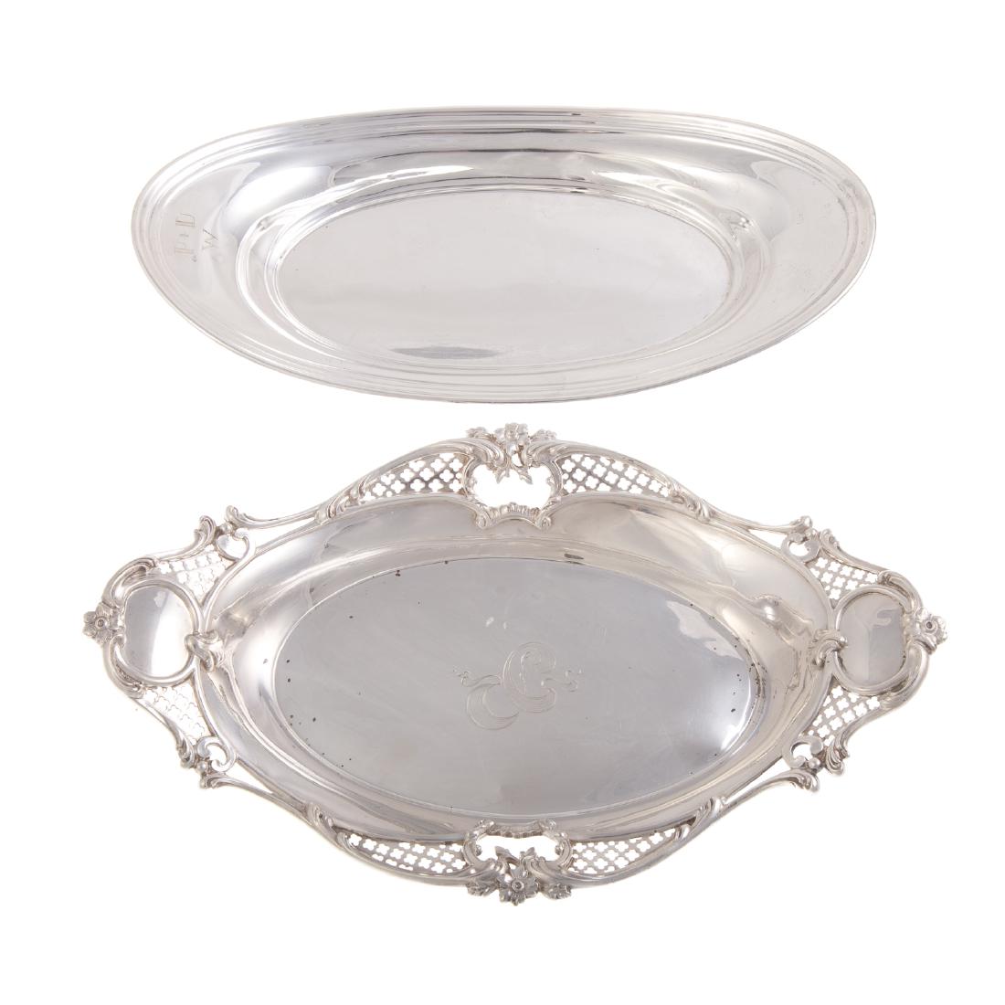 Gorham & International sterling bread trays: 1) Gorham sterling bread tray, model A4000, 20th century, 12 1/2 in. L., and 2) Rogers sterling bread tray, 12 1/4 in. L., 23.80 ozt. t.w.