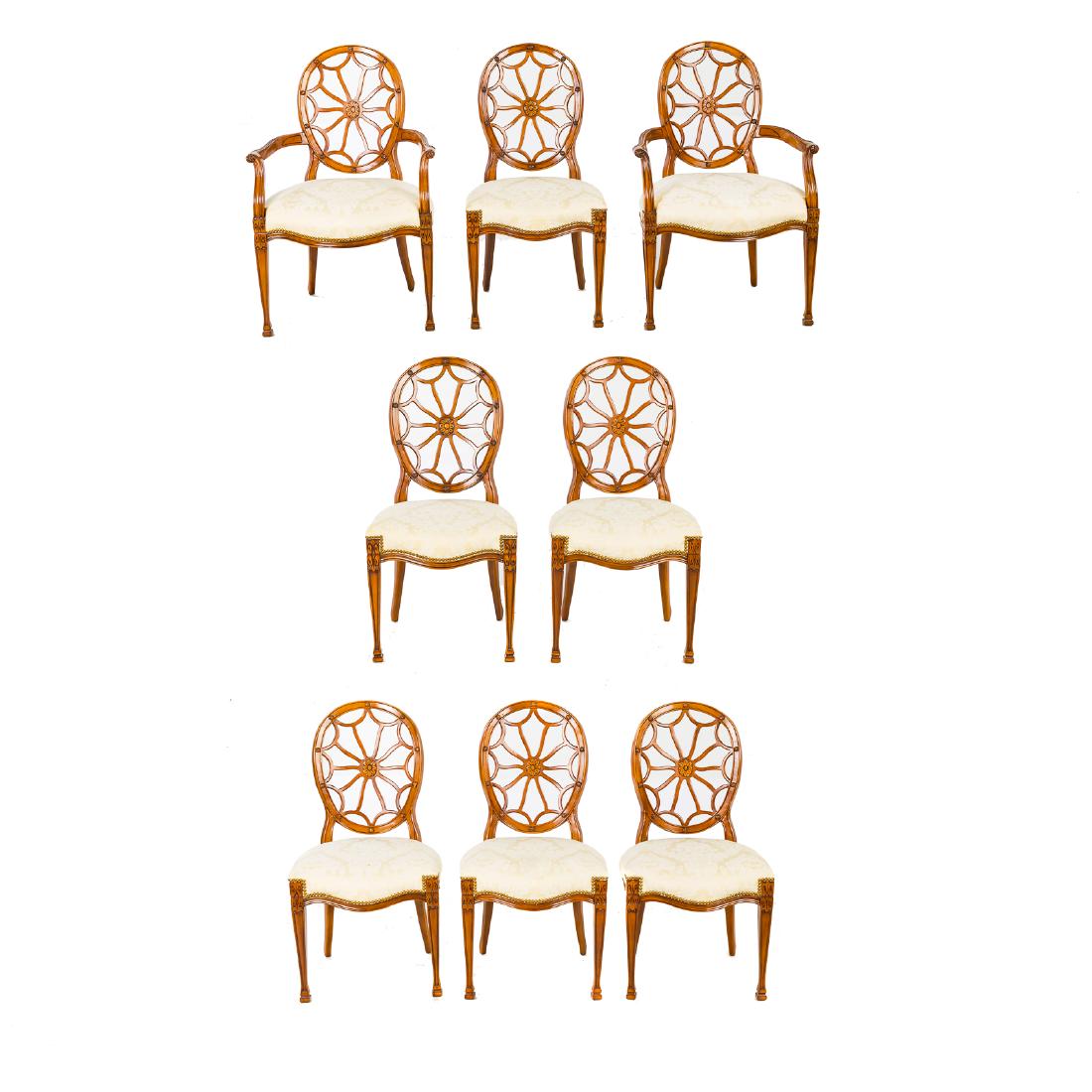 Eight John Widdicomb walnut finish dining chairs: 20th century; two arms, six sides, web motif back rests, upholstered seats, straight tapered legs, block feet, arms, 39 in. H., 27 in. W., 21 in. D., sides, 39 in. H., 20 in. W., 20 in. D.