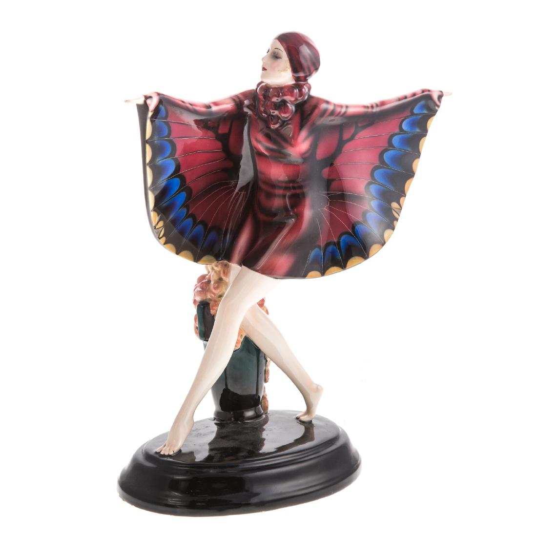 Goldscheider Art Deco figure of Butterfly Girl: impressed factory marks and numbers 6204, 1057, and 4, modeled by Josef Lorenzl, 12 in. H