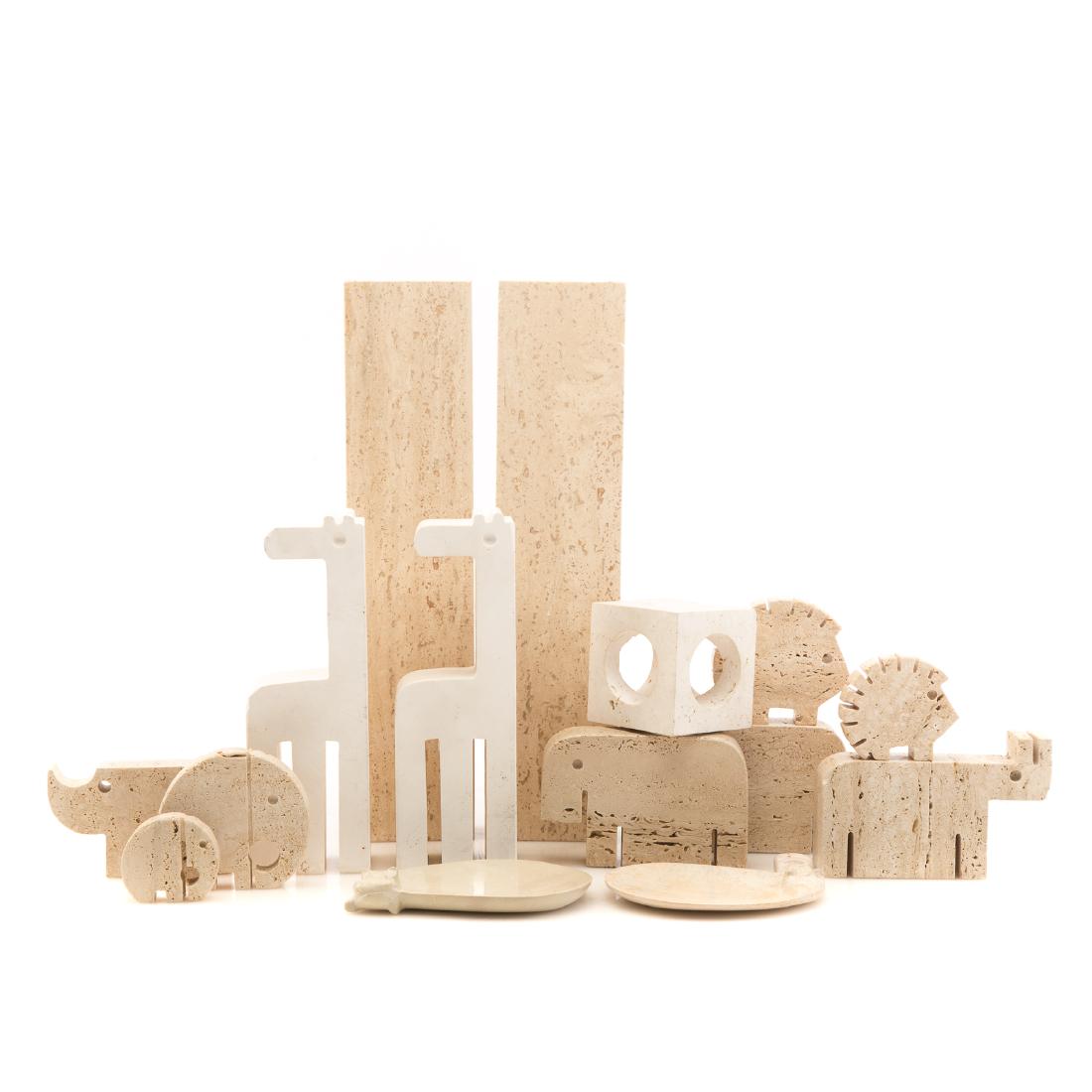 10 Italian carved travertine animals: includes; 2 giraffes, 2 hippos, Indian rhino, African rhino, 2 elephants, 2 porcupines, 2 to 9 1/2 in. H., also with a carved travertine cube sculpture, pair of rectangular travertine display bases an